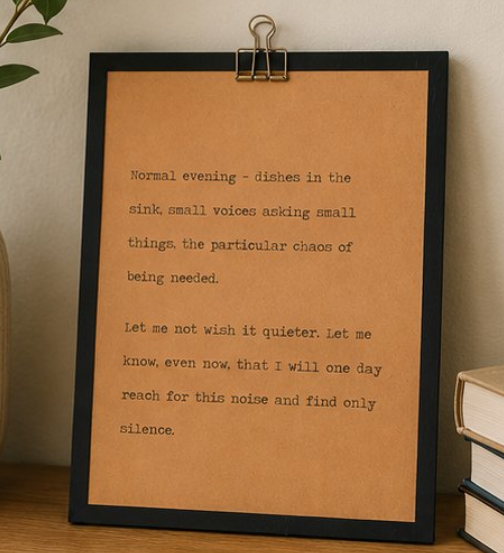 Meaningful motherhood quote wood sign with black border and kraft paper design styled beside a vase and stacked books