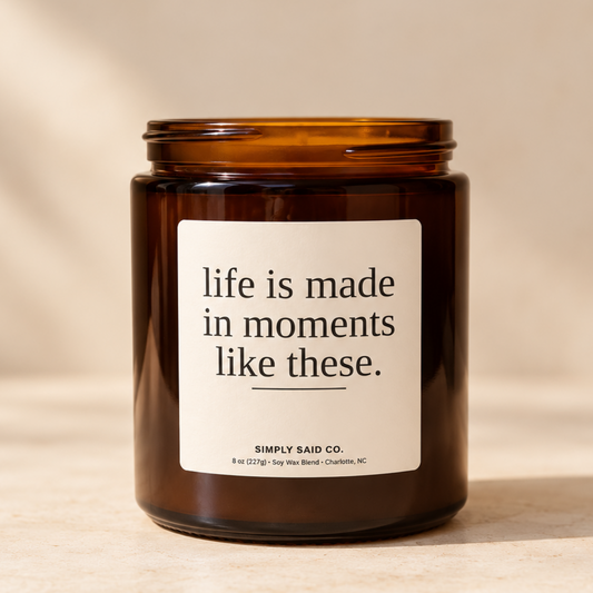Apple sandalwood cedarwood and musk scented soy candle in amber glass jar